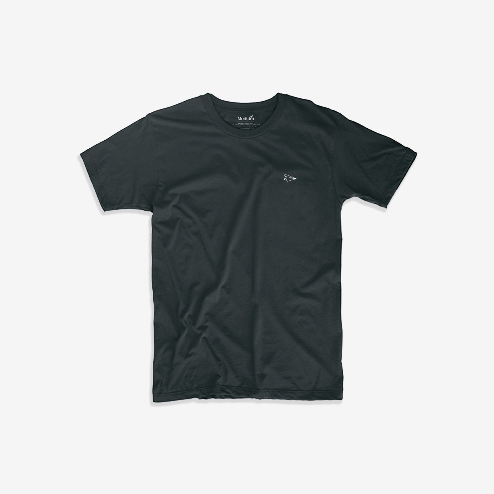 Front view of organic Launch tee with black and white paper airplane chest mark