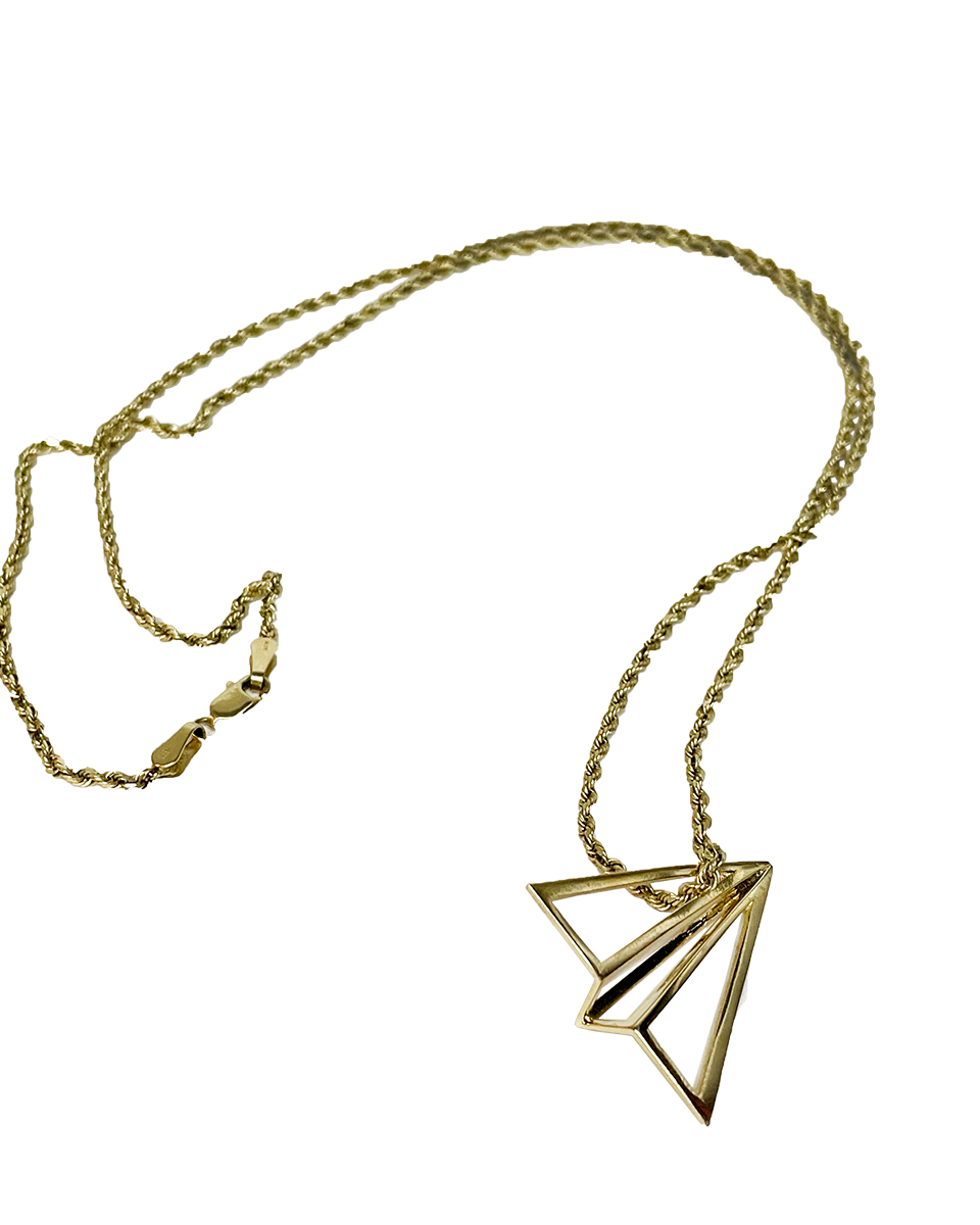 14 karat gold Launch Intention pendant with paper airplane inspired design
