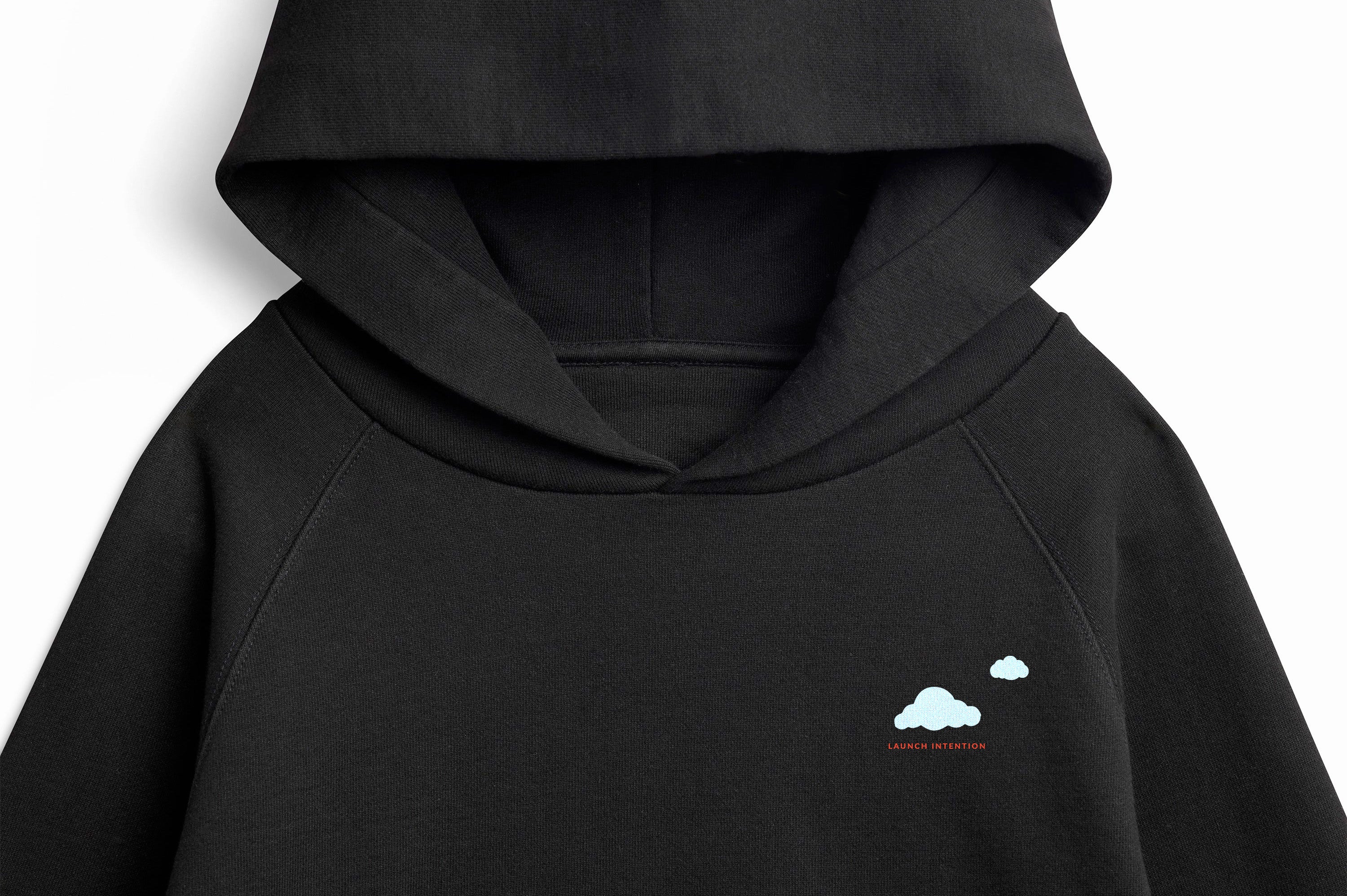 Detail view of Keep Your Head In The Clouds x SF hoodie graphic and paper plane artwork