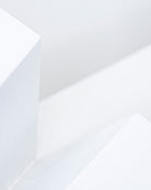 White Space 24 inch all-white paper plane sculpture by Griffin Loop