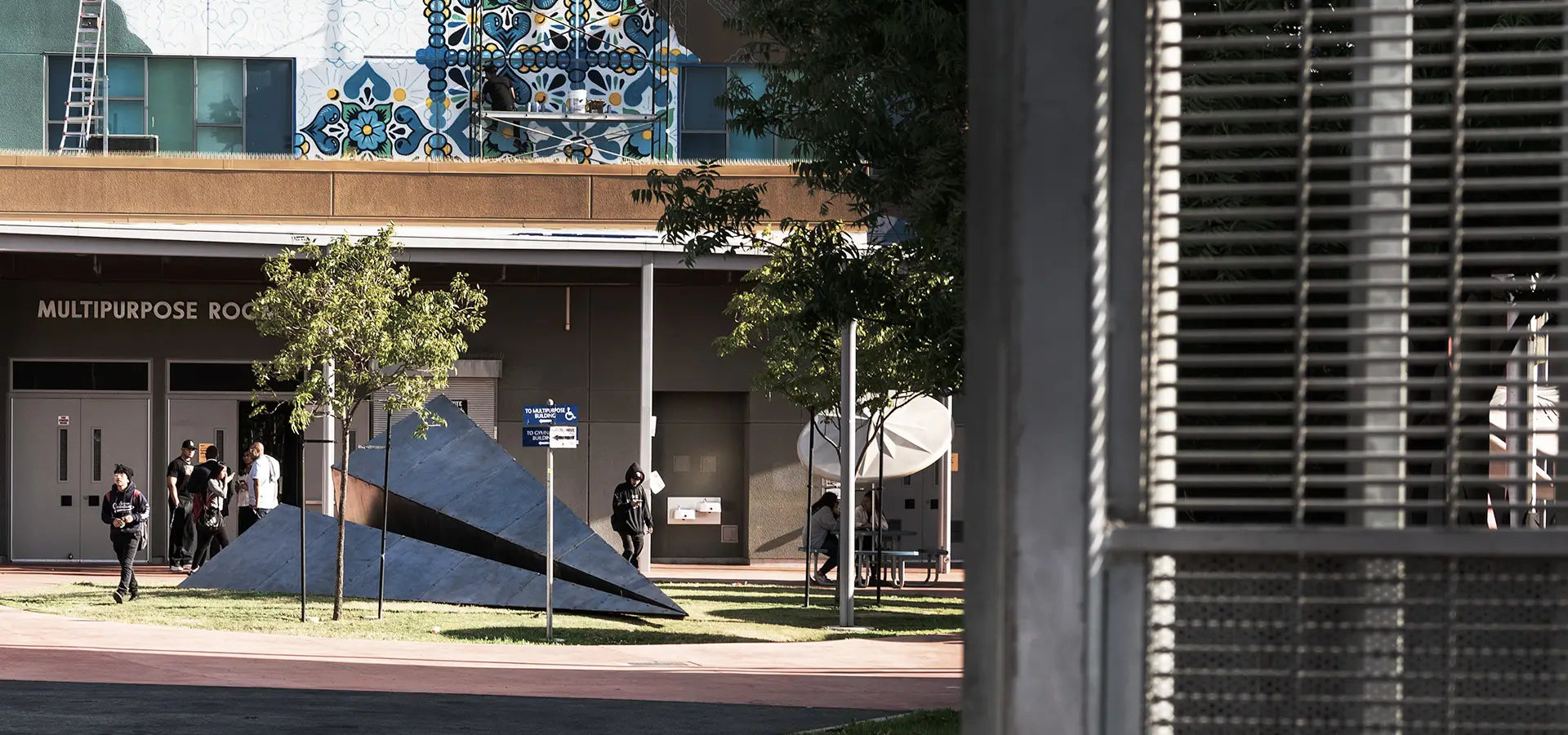Launch Intention Paper Airplane sculpture in the courtyard at the Dr. Maya Angelou Community High School mural festival.