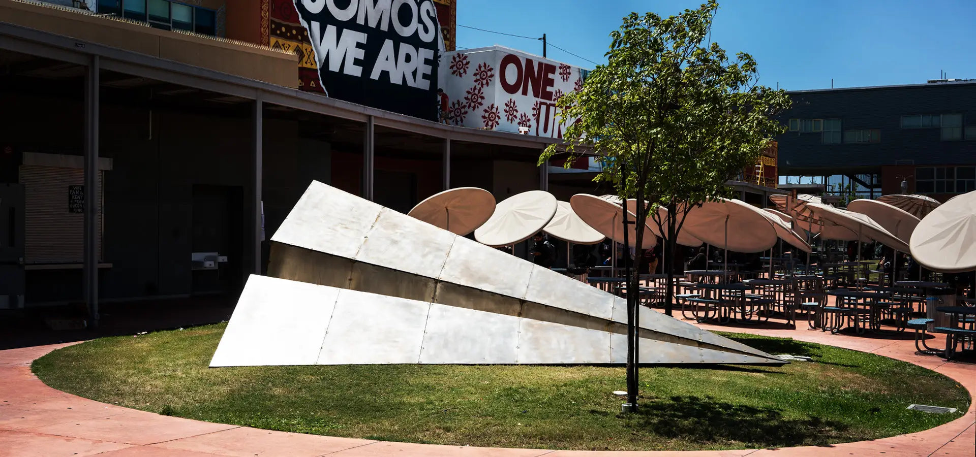 The Dr. Maya Angelou Mural Festival activation of Launch Intention's Metal Paper Airplane sculpture in the courtyard of the Community High School in Los Angeles, California.