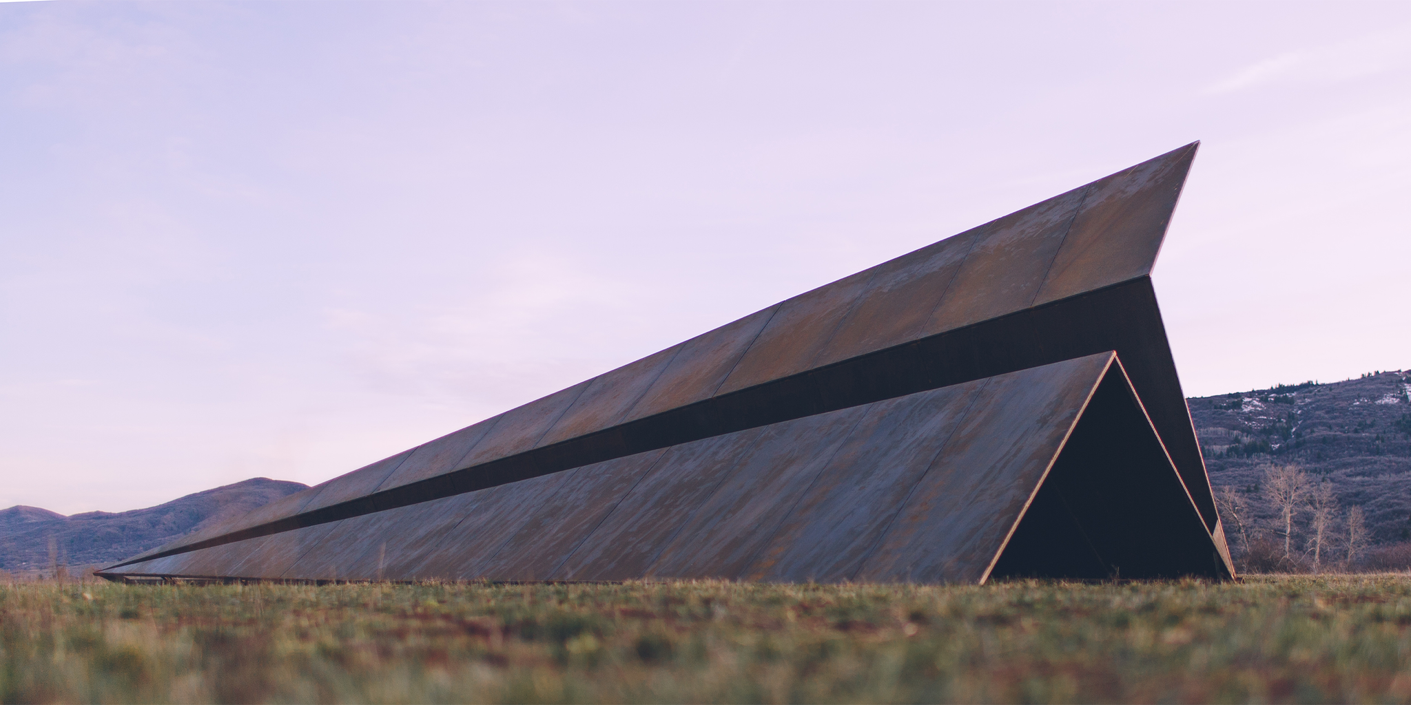 Large 50 foot Launch Intention metal paper airplane sculpture by Griffin Loop at Powder Mountain, Utah, in it's first location down in the Eden Valley.